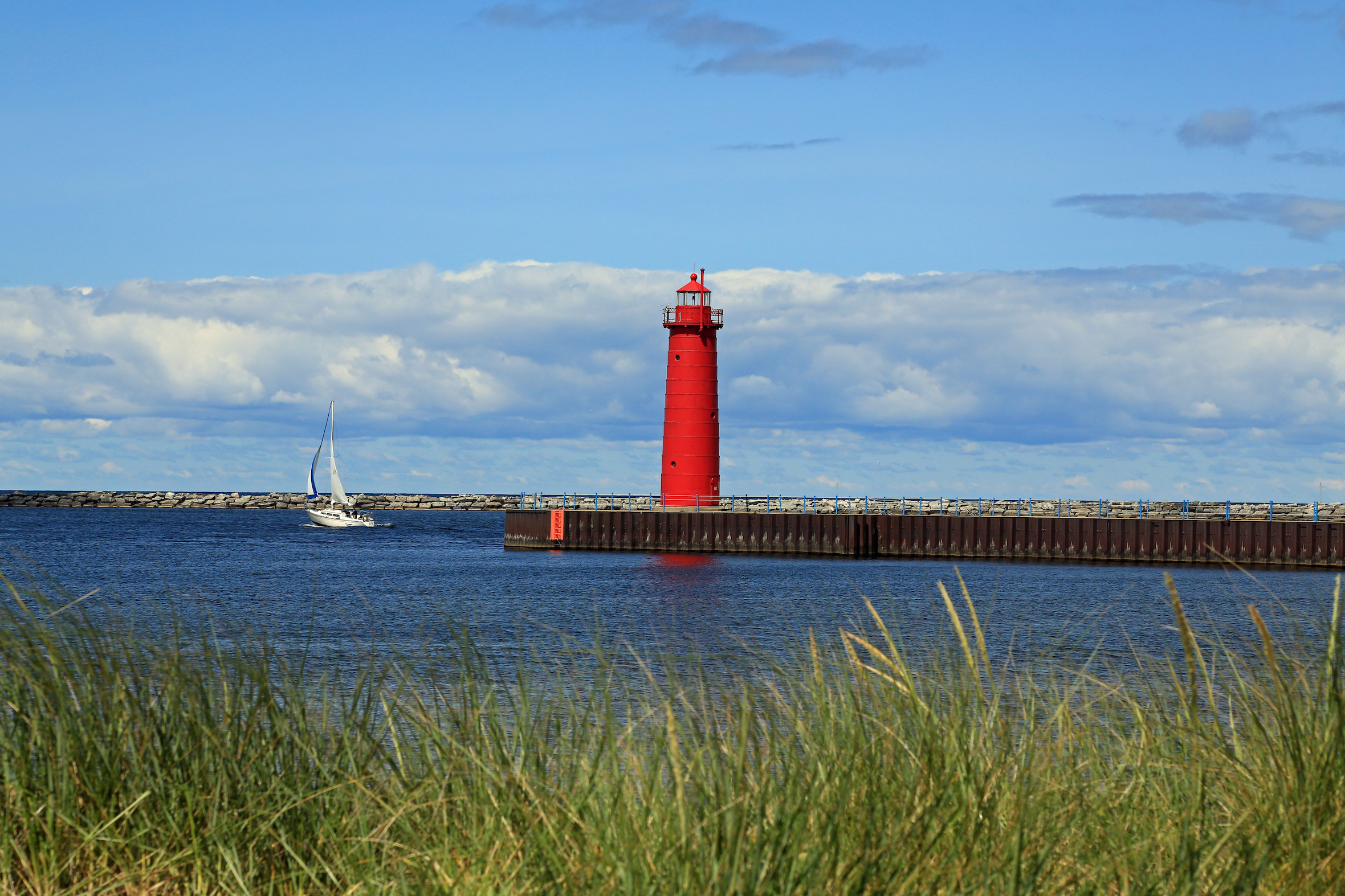 Red lighthouse in Muskegon, Michigan, USA, a West Michigan landmark.