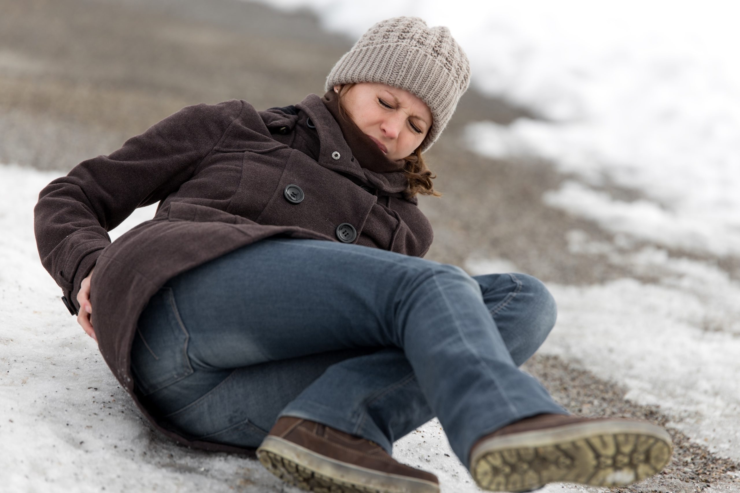 A young woman has an accident on an icy walkway in Michigan.